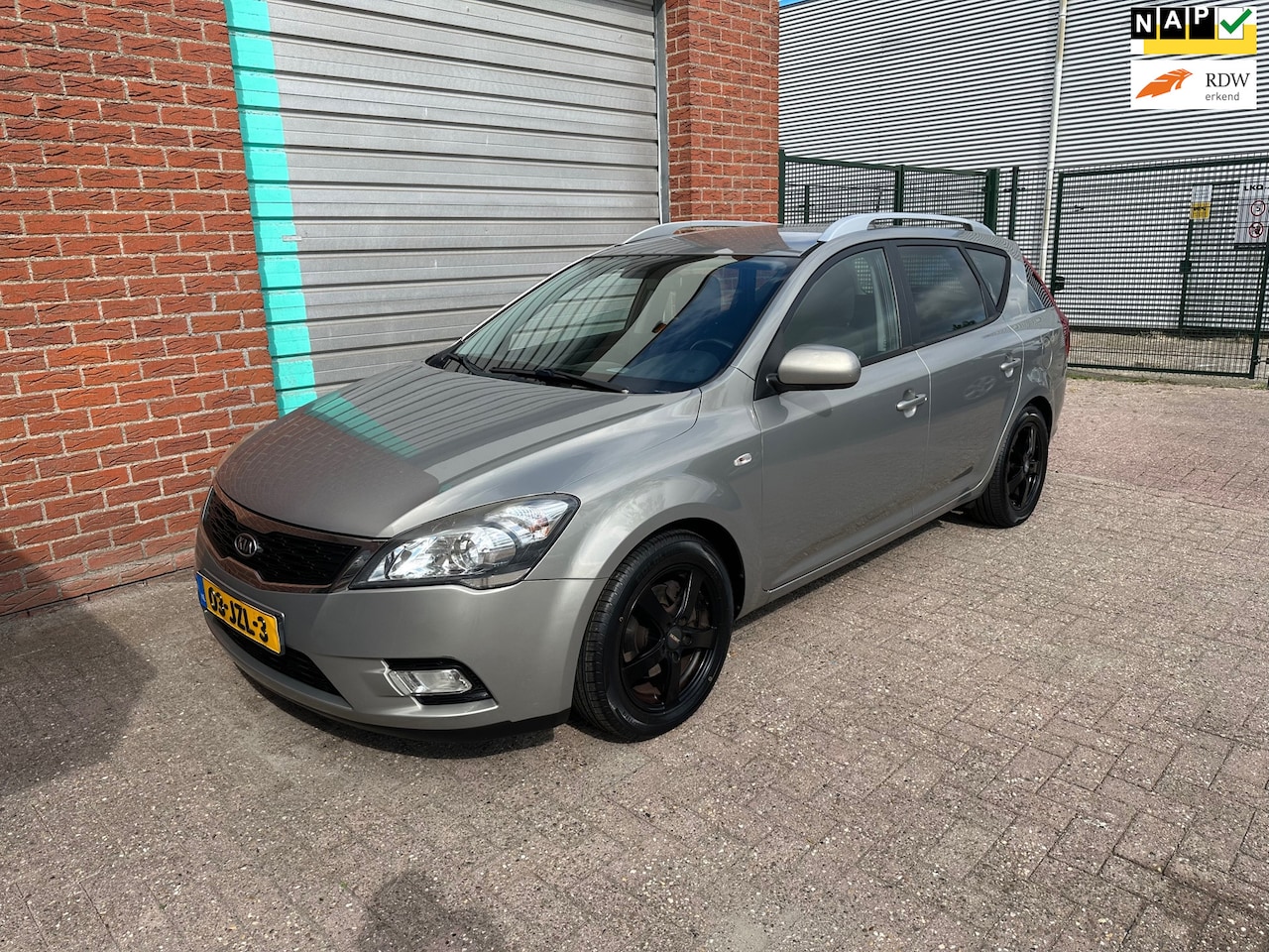 Kia Cee'd Sporty Wagon - 1.4 CVVT X-ecutive Airco! Bj:2009 NAP! - AutoWereld.nl