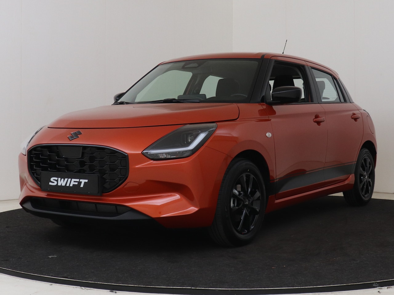 Suzuki Swift - 1.2 Blackline Smart Hybrid Ltd. 10 jaar Fabrieksgarantie - AutoWereld.nl