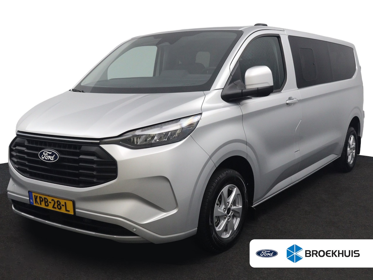 Ford Transit Custom - 340 2.5 PHEV L2H1 Kombi Limited | 8-Persoons | Trekhaak | Toegang zero emissiezone | CarP - AutoWereld.nl