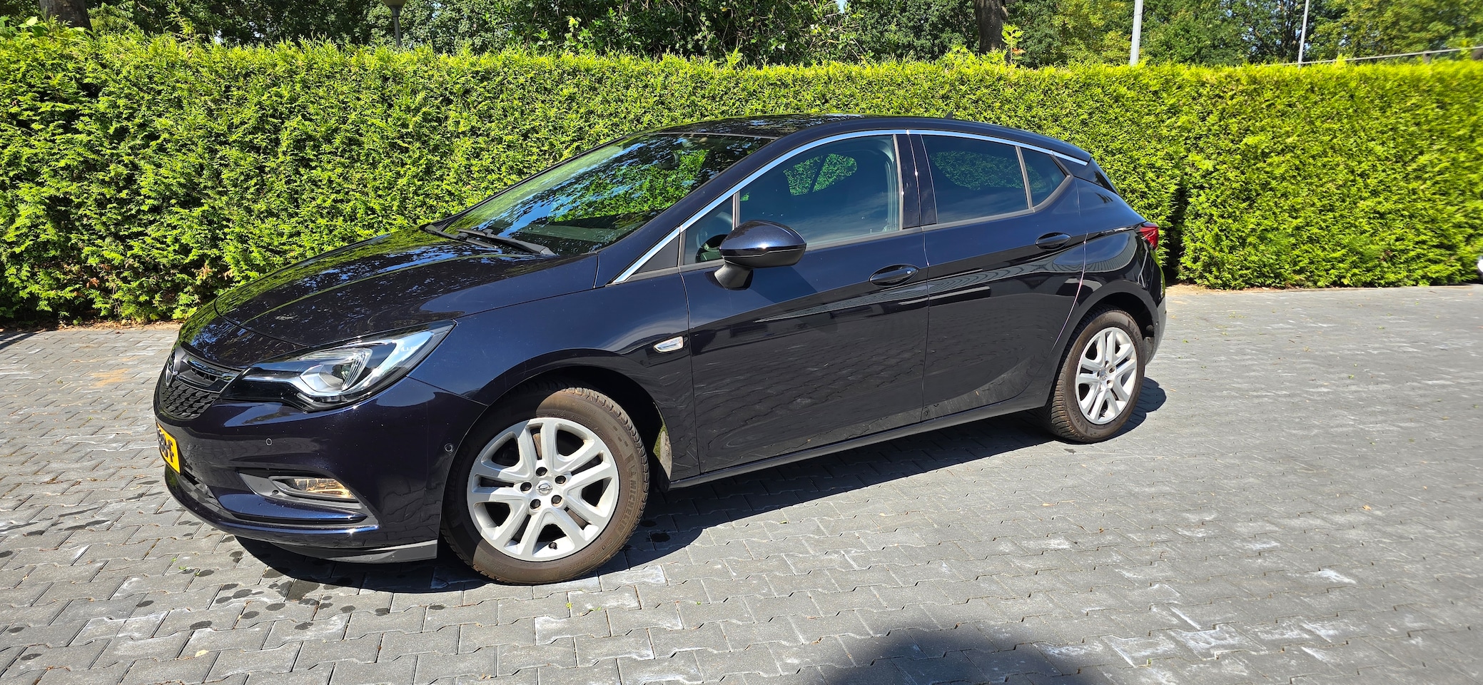 Opel Astra - 1.0 Selection stuur- en stoelverwarming, trekhaak, DAB+ - AutoWereld.nl
