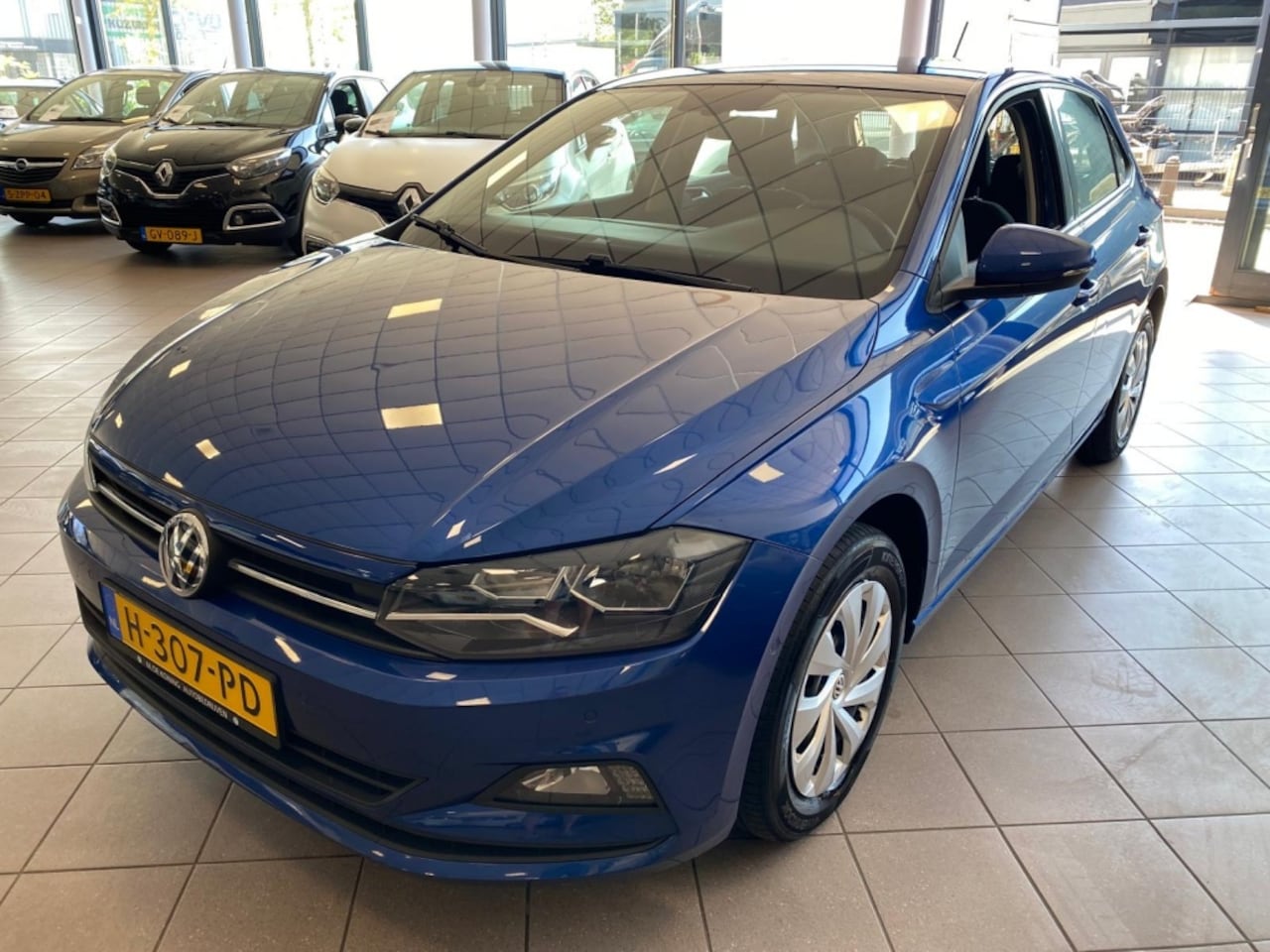 Volkswagen Polo - 1.0 TSI Comf.l. Bus. Eerste Eig BJ 2020 !!! - AutoWereld.nl