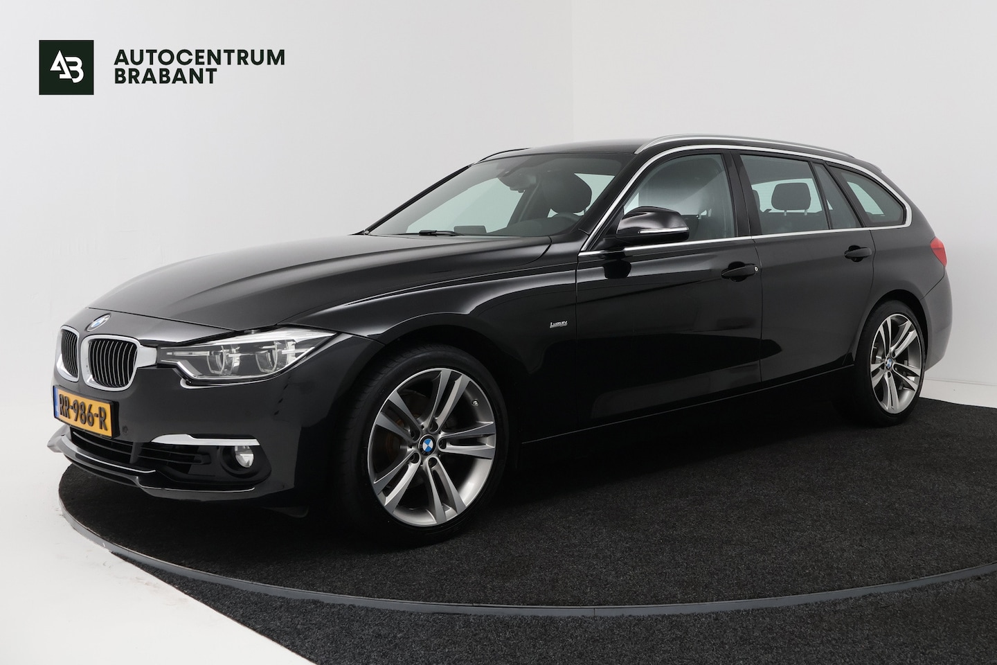 BMW 3-serie Touring - 318i High Executive (NAVIGATIE, TREKHAAK, STOELVERWARMING, DEALER ONDERHOUDEN, LEDER, LED) - AutoWereld.nl