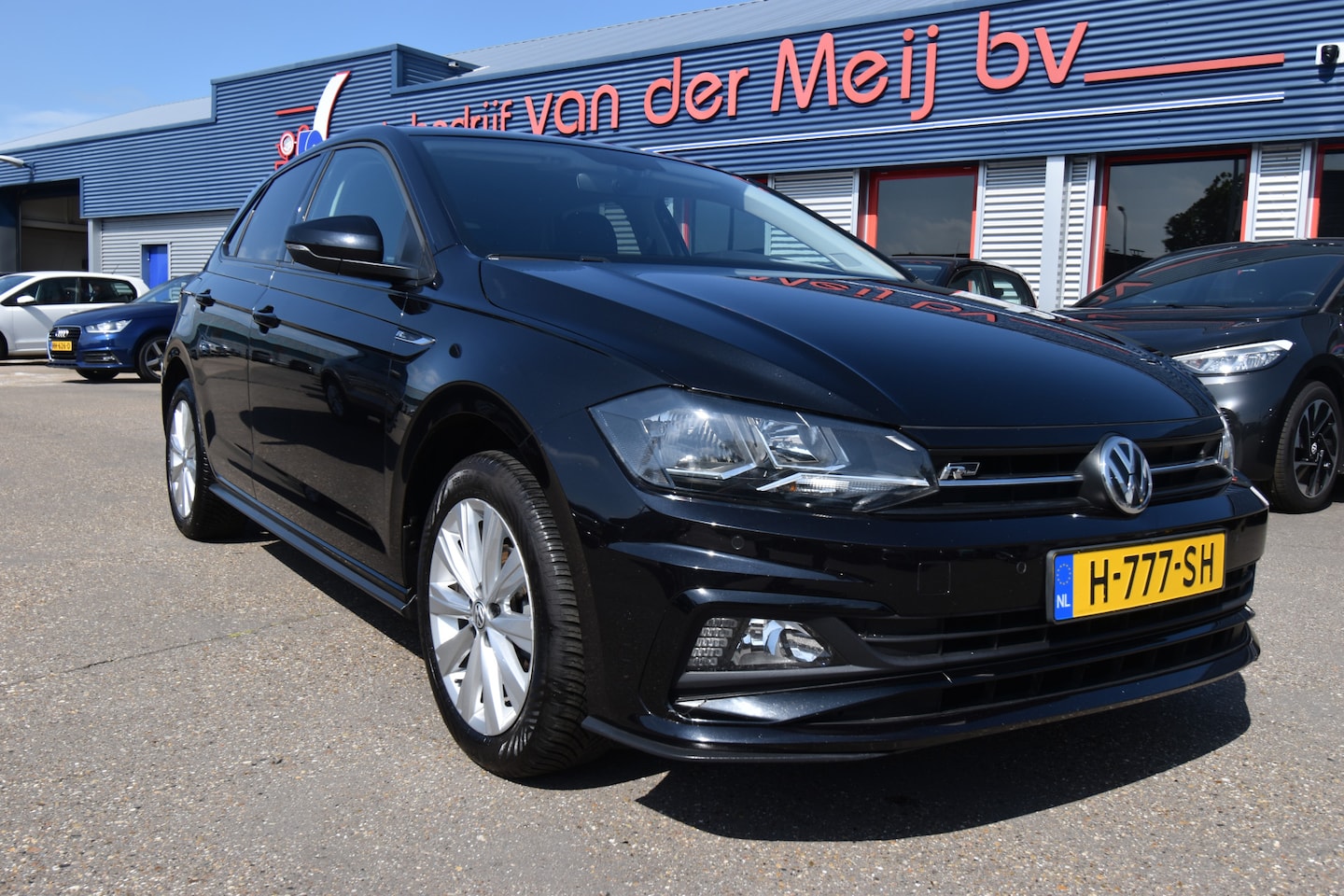 Volkswagen Polo - 1.0 TSI Comfortline R-Line , NAVI , LMV16 , PDC V+A , CR CONTR , AIRCO , - AutoWereld.nl