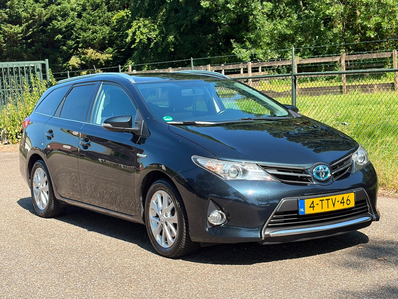 Toyota Auris Touring Sports - 1.8 Hybrid Lease /Navi/Pano/Camera/ - AutoWereld.nl