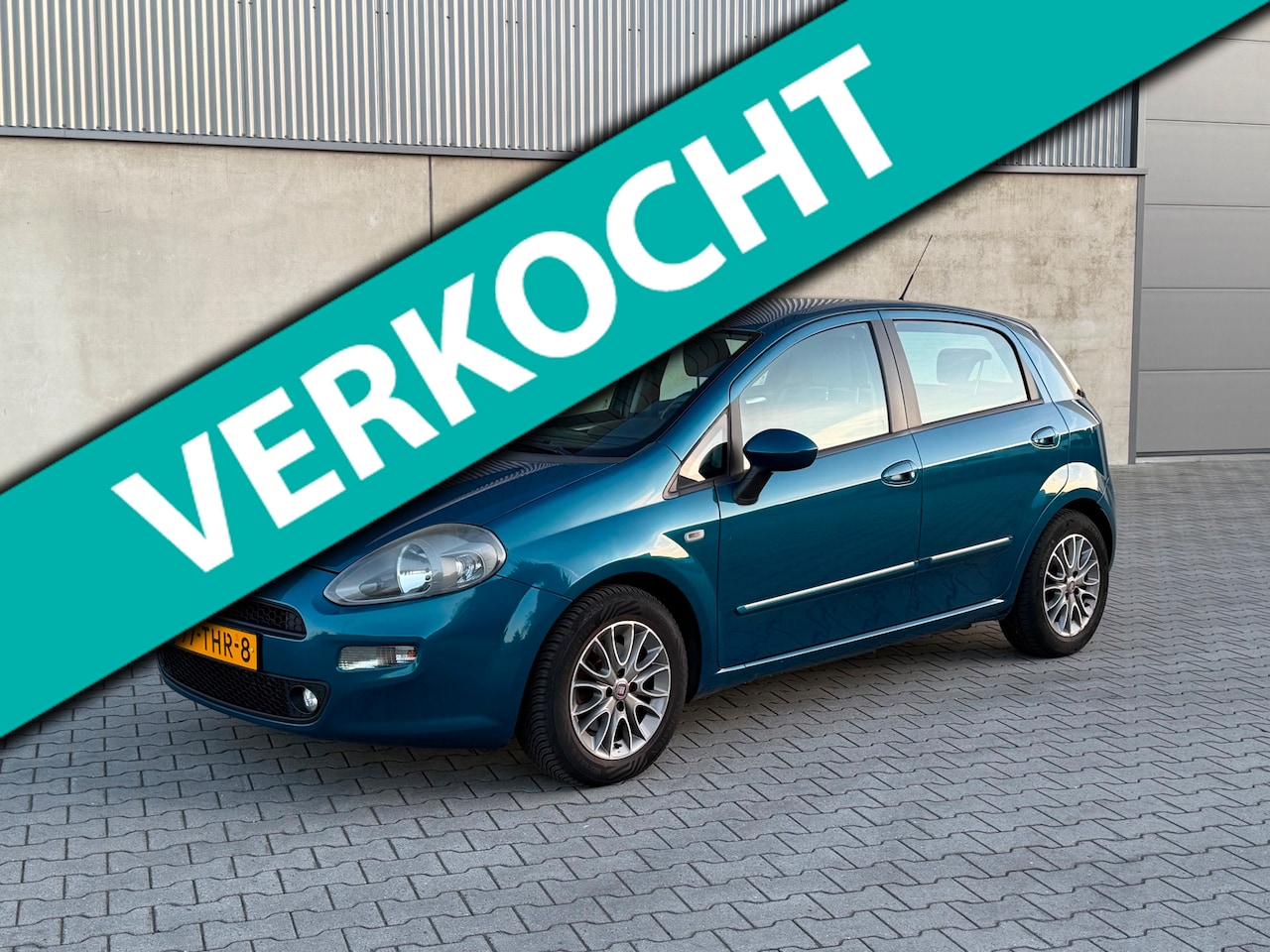 Fiat Punto Evo - 1.3 M-Jet Easy APK 28-04-2027+CLIMATE AIRCO+CRUISE+RADIO USB AUX+TREKHAAK+2 SLEUTELS - AutoWereld.nl
