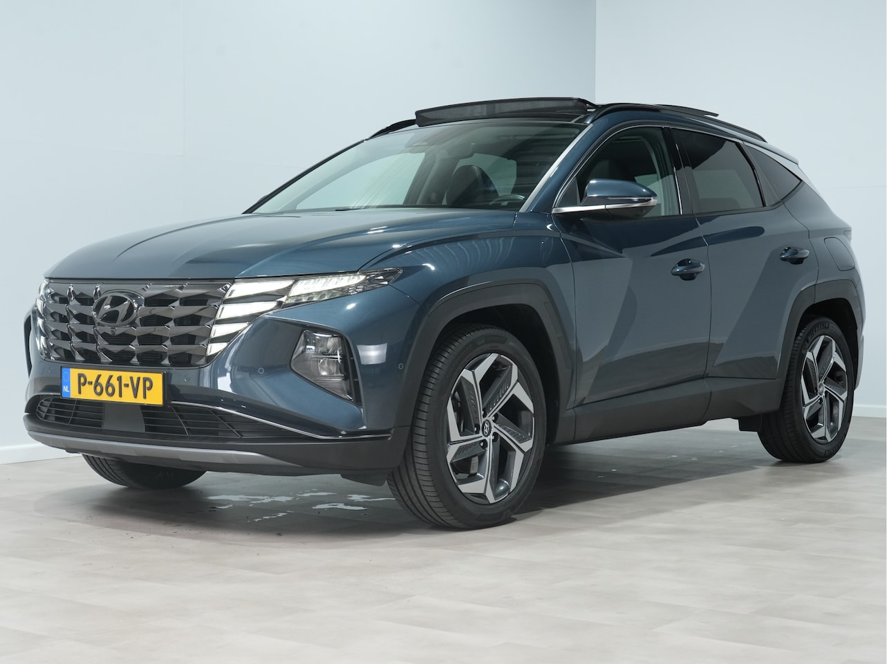 Hyundai Tucson - 1.6 T-GDI 230pk HEV Premium Sky / Panoramadak / Trekhaak 1650 kg 90 - AutoWereld.nl