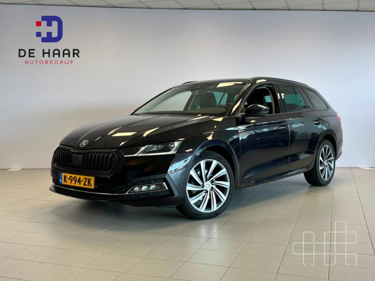 Skoda Octavia - 2.0 TDI Style Business - Trekhaak - Keyless - Navigatie - AutoWereld.nl