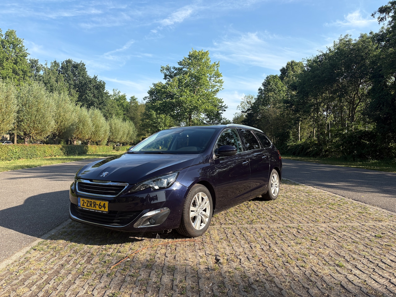 Peugeot 308 SW - 1.2 PureTech Allure - AutoWereld.nl