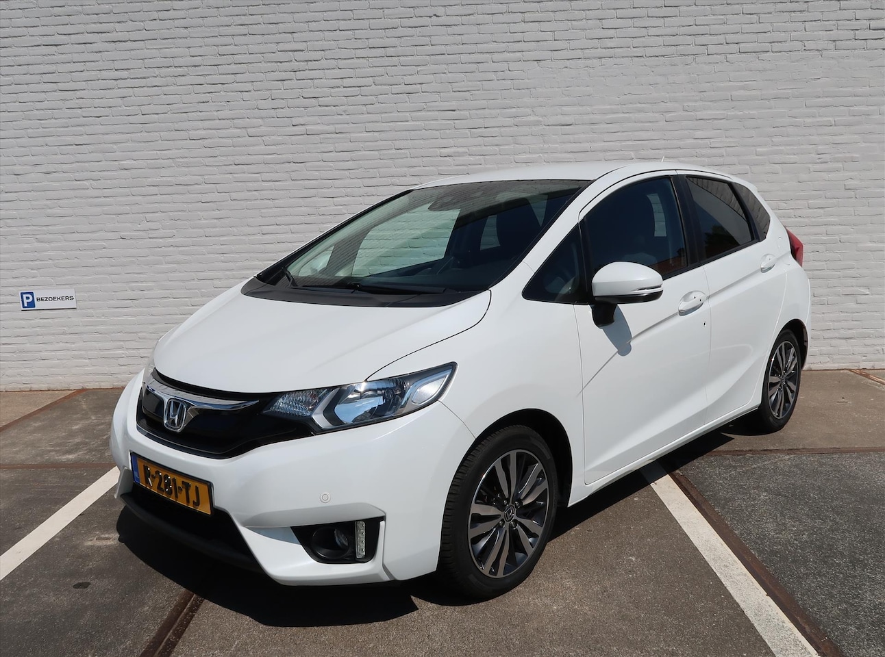Honda Jazz - 1.3 i-VTEC 102pk Elegance I Navi I Climate Control I Camera I PDC V + A I Trekhaak I Verwa - AutoWereld.nl