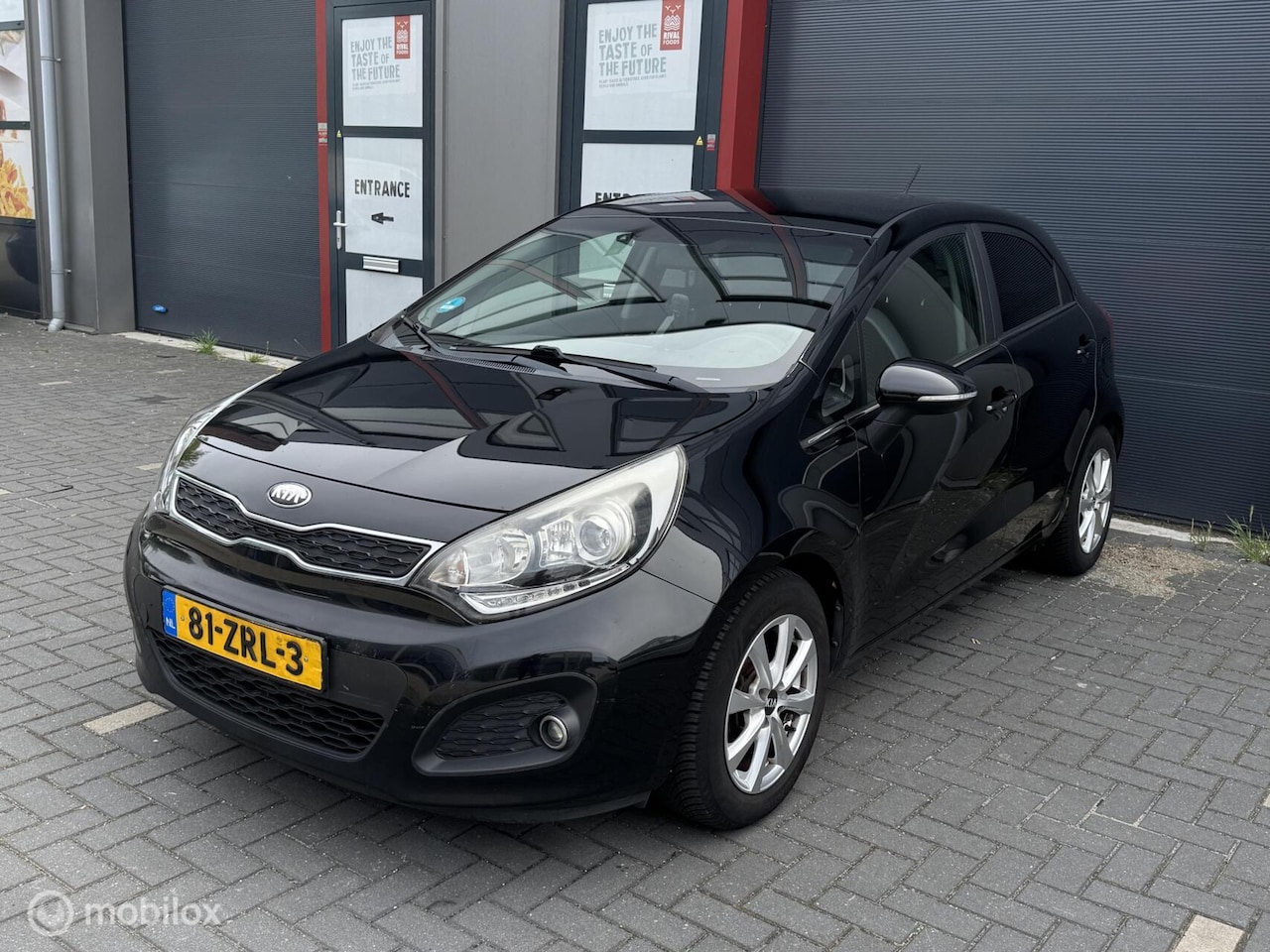 Kia Rio - 1.2 CVVT Super Pack 1.2 CVVT Super Pack, Keyless, Cruise, Climate, PDC - AutoWereld.nl