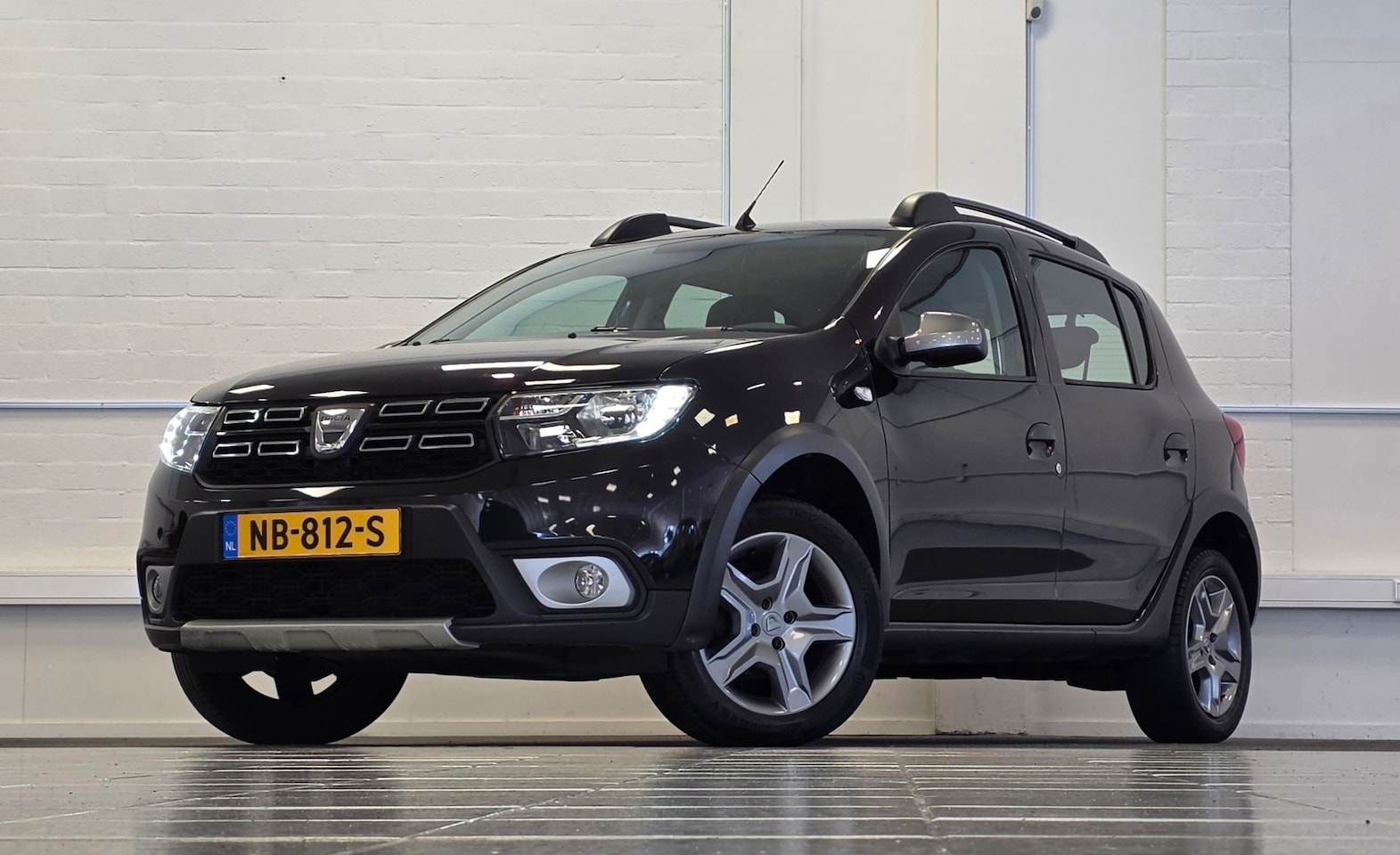 Dacia Sandero Stepway - 0.9 TCe SL Trekhaak Navigatie PDC Garantie - AutoWereld.nl