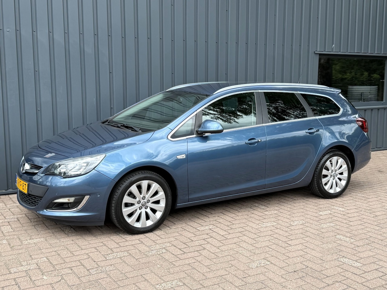 Opel Astra Sports Tourer - 1.4 Turbo Cosmo AUTOMAAT!/1E EIGENAAR!/NL AUTO!/NAP!/ - AutoWereld.nl