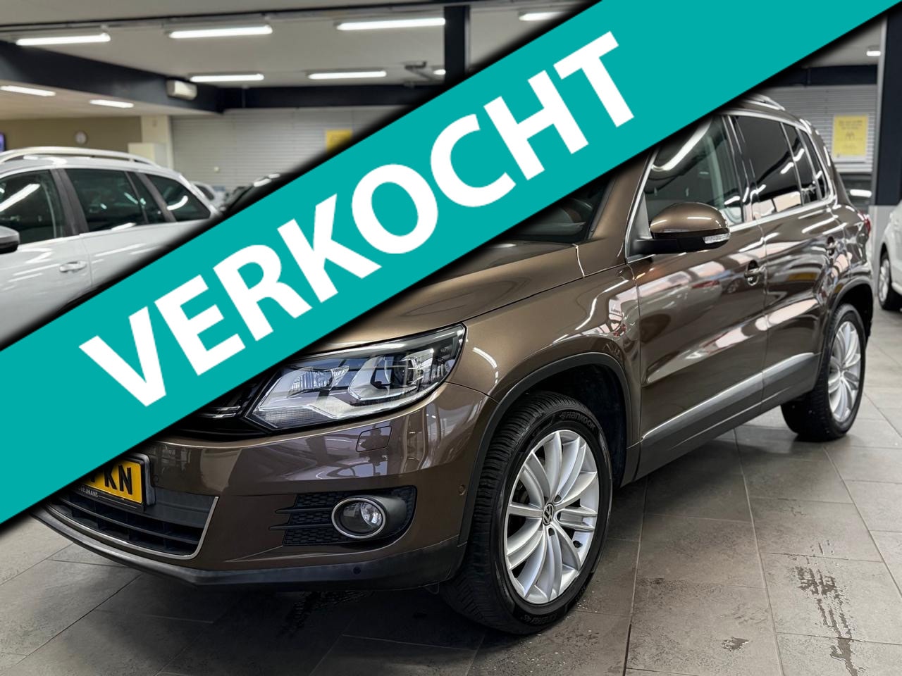 Volkswagen Tiguan - 2.0 TSI Sport&Style 4Motion panorama dak leer stoelverwarming xenon led navi trekhaak pdc - AutoWereld.nl