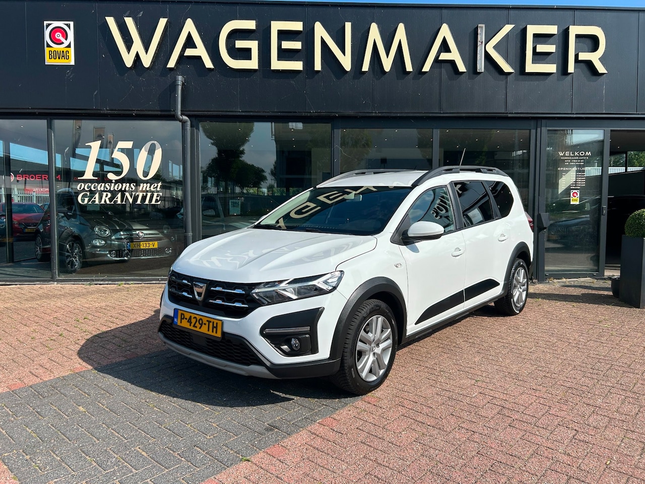 Dacia Jogger - 1.0 TCe Comfort 7p. Airco|Cruise|NAVI|Trekhaak - AutoWereld.nl