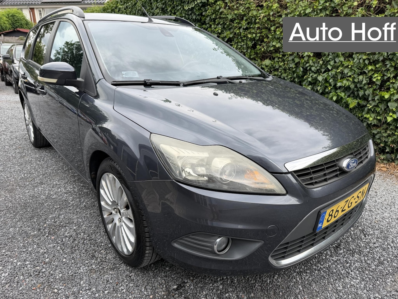 Ford Focus Wagon - 1.6 Titanium | Navi | Autom. Airco | Cruise Control | LMV | Privacy Glass | PDC | Trekhaak - AutoWereld.nl