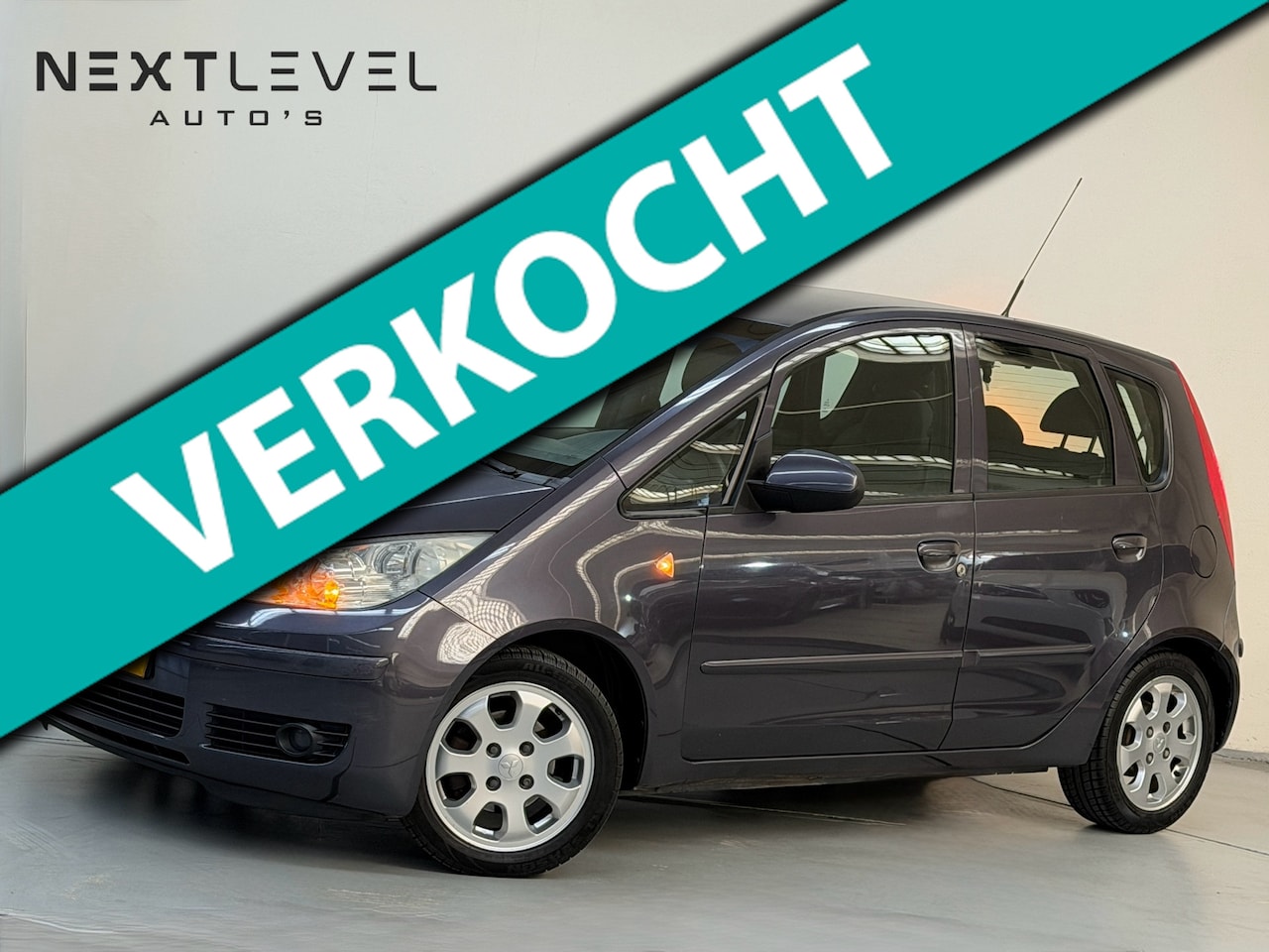 Mitsubishi Colt - 1.3 Inform Cool Airco Beurt All Season Banden - AutoWereld.nl