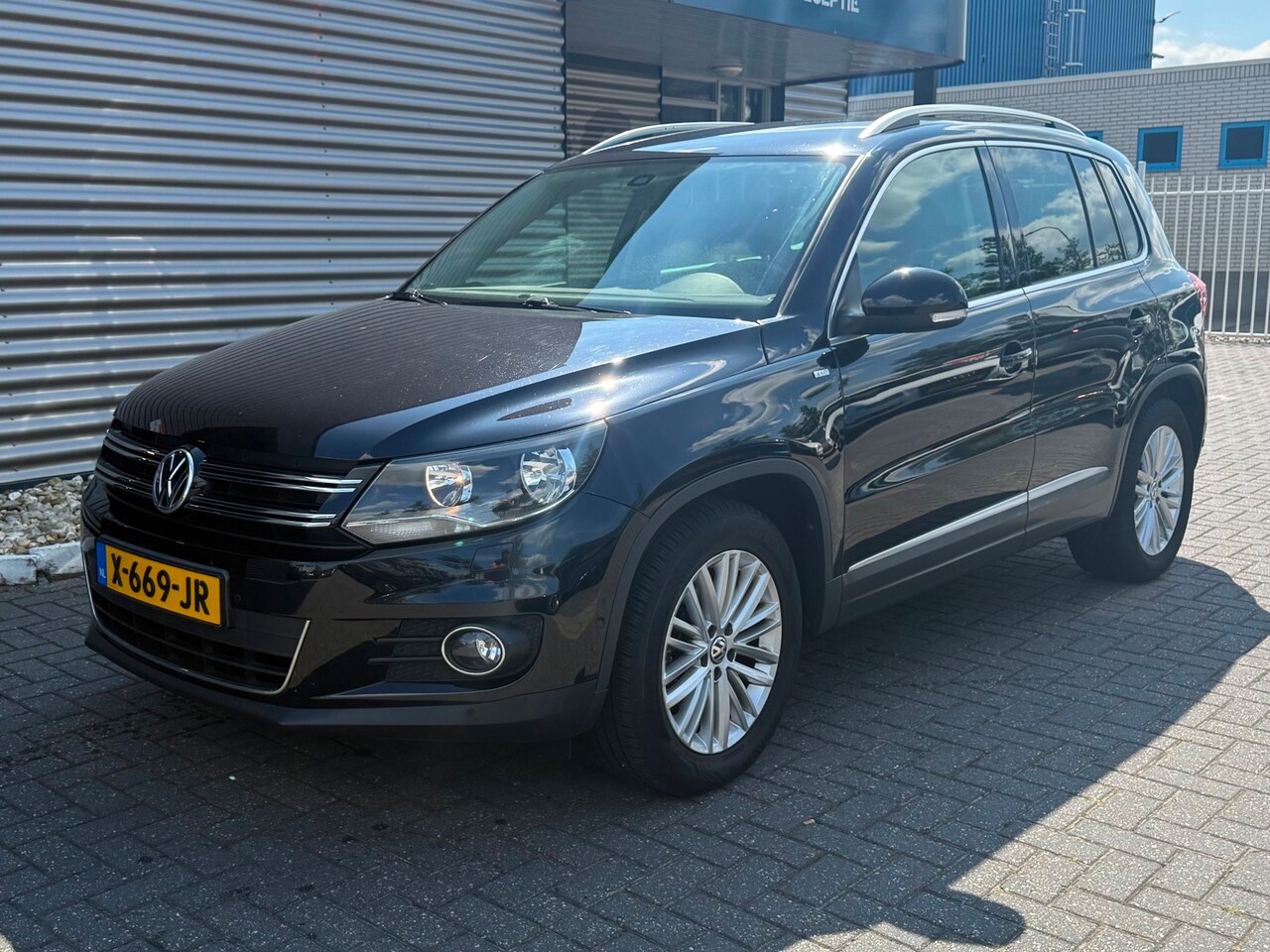 Volkswagen Tiguan - 1.4 TSI Sport&Style - AutoWereld.nl