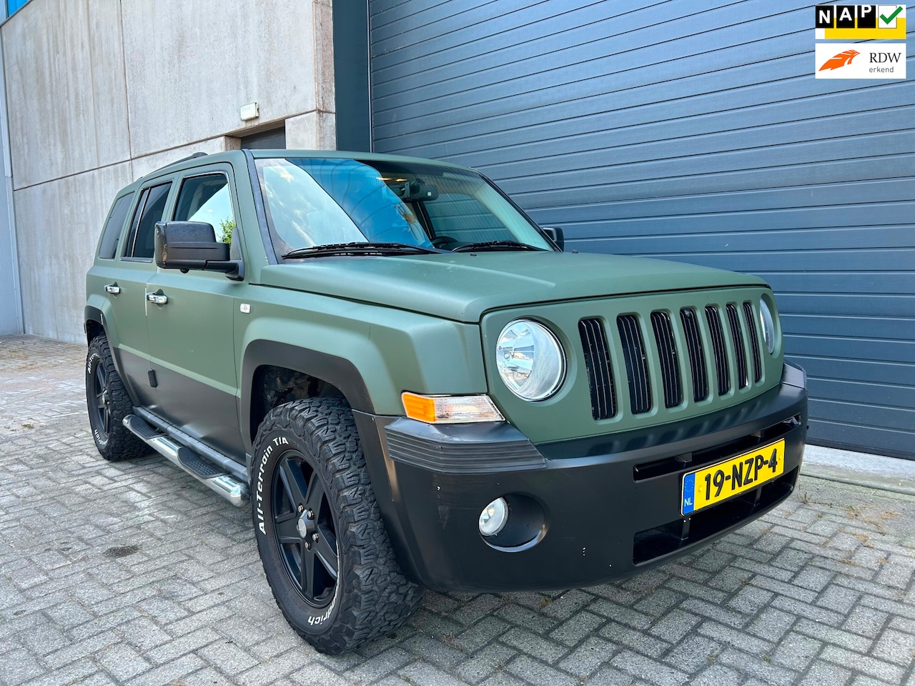 Jeep Patriot - 2.4i Limited Liberty AUT LEDER CLIMA 4WD NAP - AutoWereld.nl