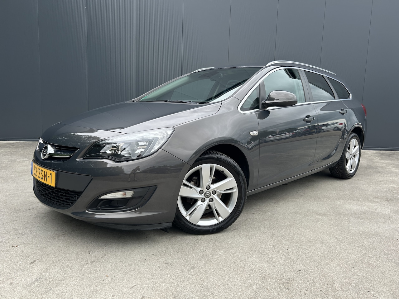 Opel Astra Sports Tourer - 1.4 Turbo Sport NAVI CRUISE AIRCO TREKHAAK - AutoWereld.nl