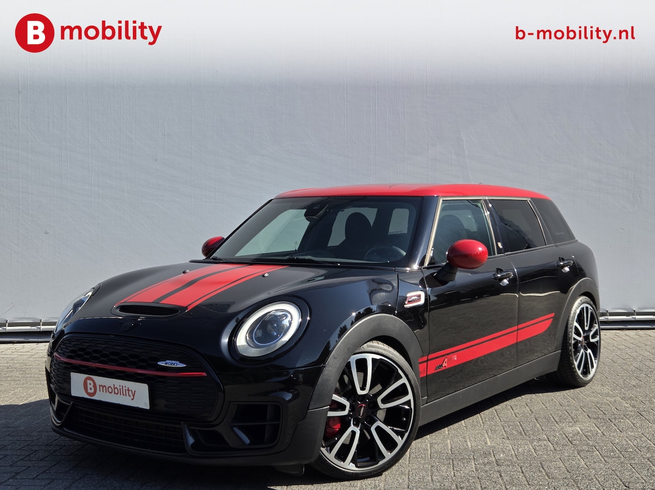MINI Clubman - 2.0 John Cooper Works ALL4 Chili | LED | Navigatie | PDC | Cruise Control | Sportstoelen - AutoWereld.nl