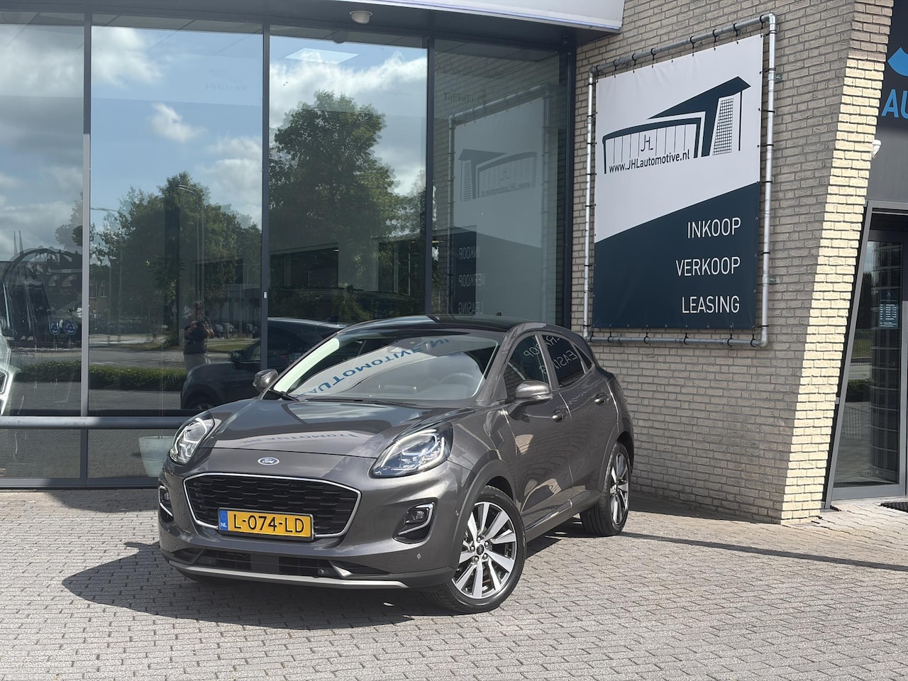 Ford Puma - 1.0 EcoBoost Hybrid Titanium*ACC*PANO*CAM*LED*NAVI - AutoWereld.nl