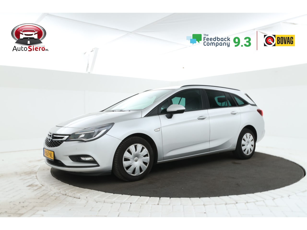 Opel Astra Sports Tourer - 1.6 CDTI Business Automaat, Stoelverwarming, Climate - AutoWereld.nl