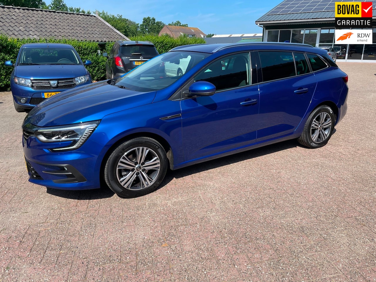 Renault Mégane Estate - 1.3 TCe Intens 140 EDC, Navi, Trekhaak, Pdc v+a - AutoWereld.nl