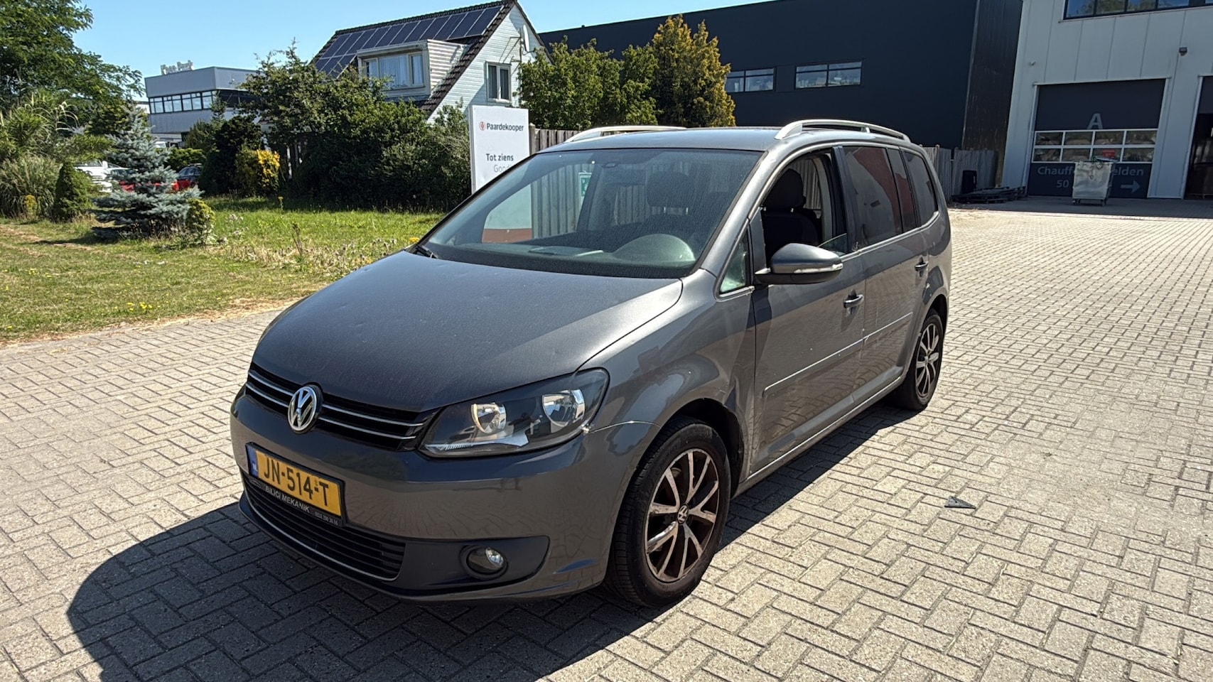 Volkswagen Touran - 1.6 TDI Highline BlueMotion HIGLINE CLIMA GRIJS 2012 - AutoWereld.nl