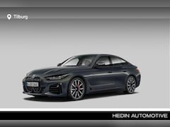 BMW i4 - eDrive40 High Executive 84 kWh | Achteruitrijcamera | Harman Kardon | M Sportpakket Pro |