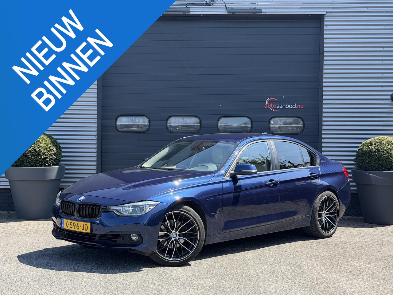 BMW 3-serie - 330e High Executive SOH 91,3% | Navigatie | Lederen Bekleding | 19 Inch Lichtmetalen Velge - AutoWereld.nl