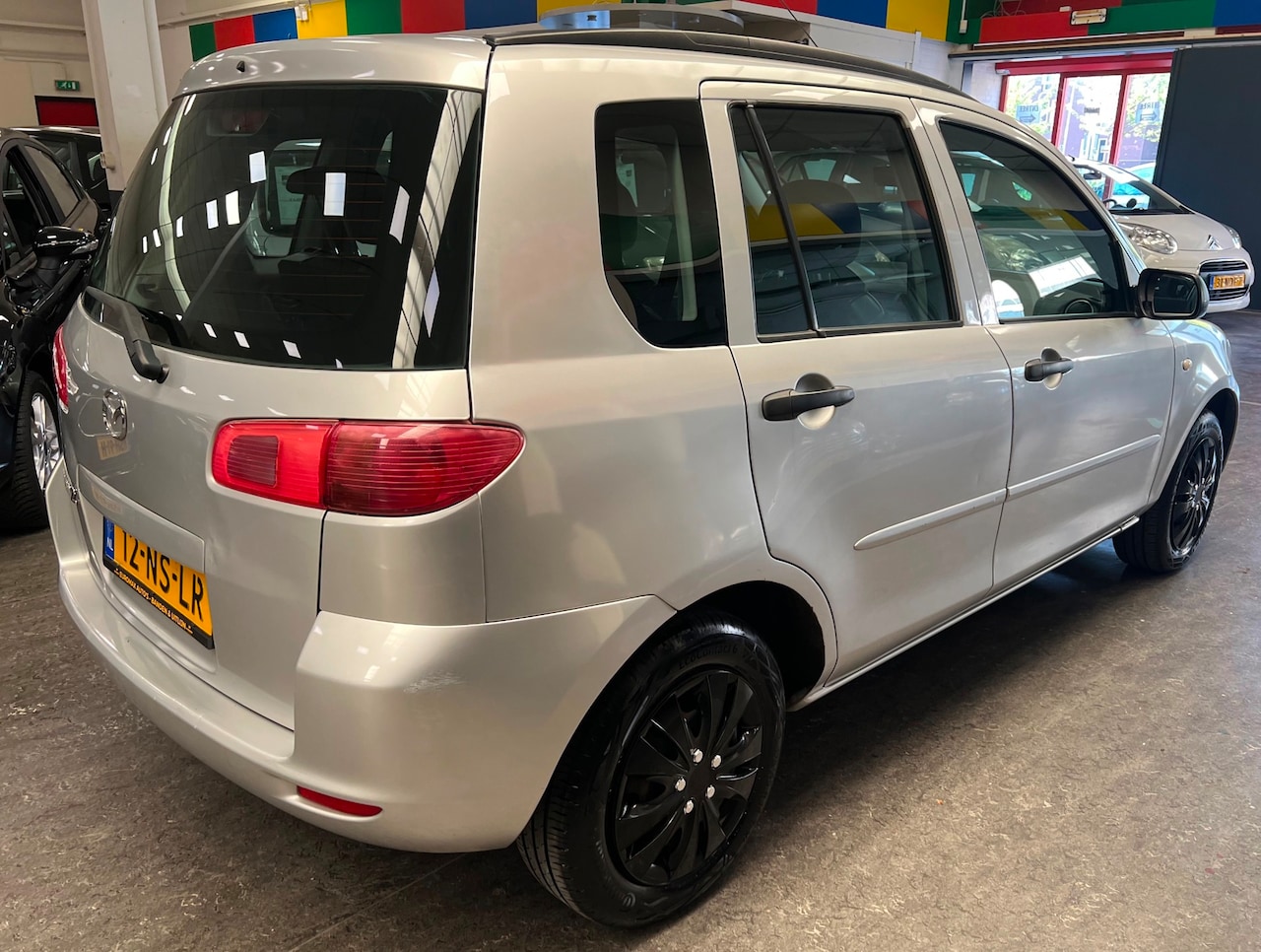 Mazda 2 - 1.4 Exclusive - 2e eigenaar – Airco – 4 nieuwe banden – NAP – Rijklaar. - AutoWereld.nl