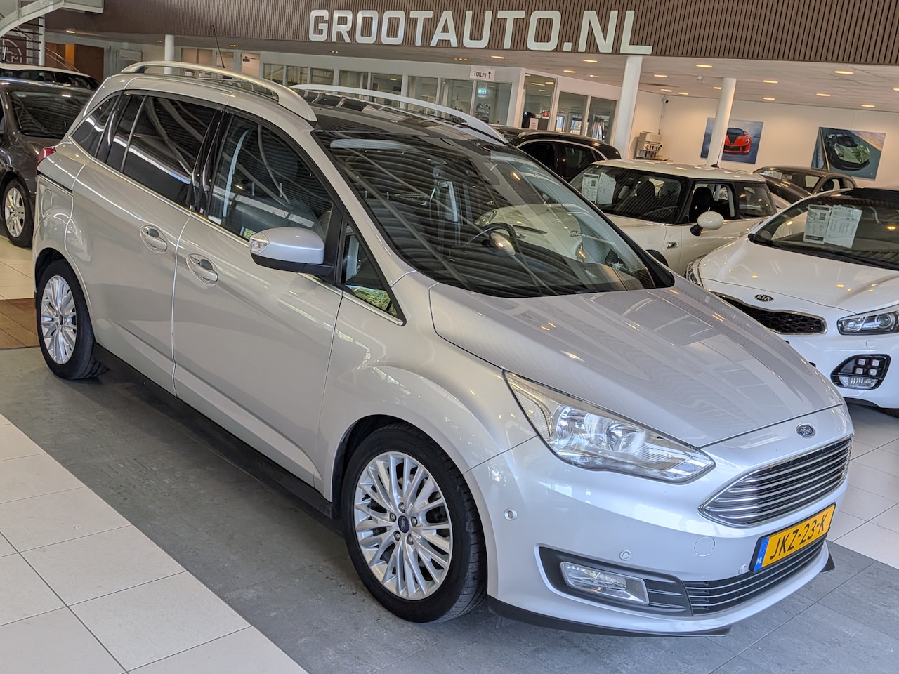 Ford Grand C-Max - 1.5 Titanium 7p. 7 Persoons, Trekhaak, Airco, Cruise Control - AutoWereld.nl