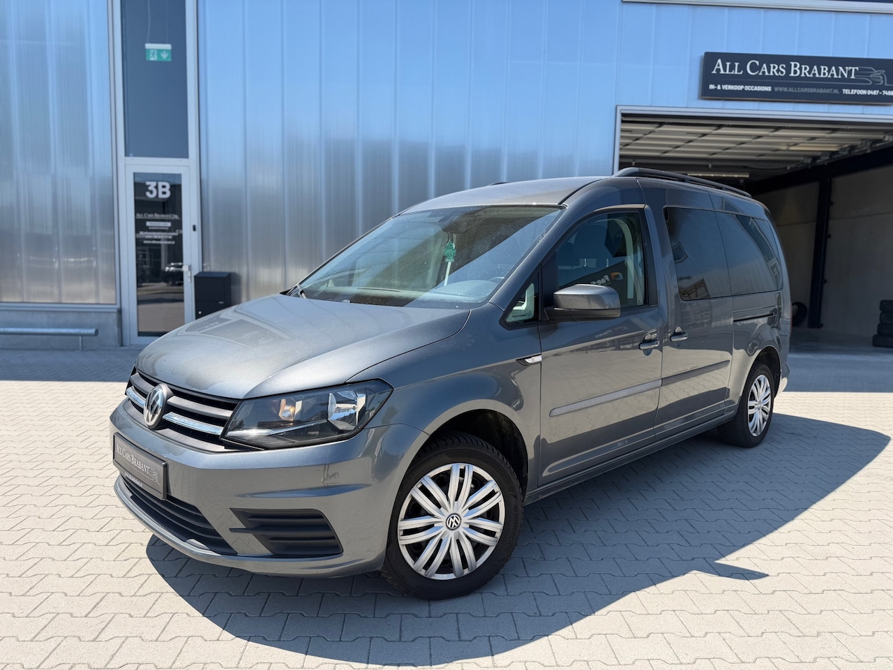 Volkswagen Caddy Maxi - 1.4 TSI 7 persoons / 1 eigenaar / navi / trekhaak - AutoWereld.nl