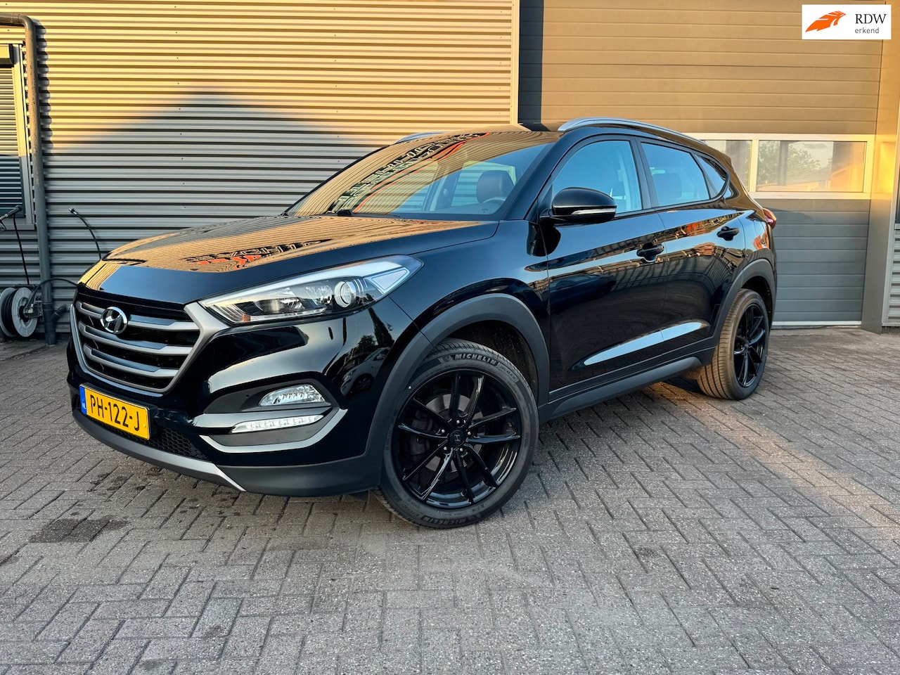 Hyundai Tucson - 1.6 GDi Comfort Black Edition | Trekhaak | Dealer Onderhouden. - AutoWereld.nl