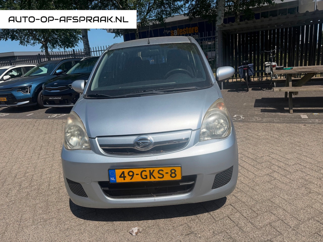 Daihatsu Cuore - 1.0 Premium 5drs. Airco Trekhaak - AutoWereld.nl