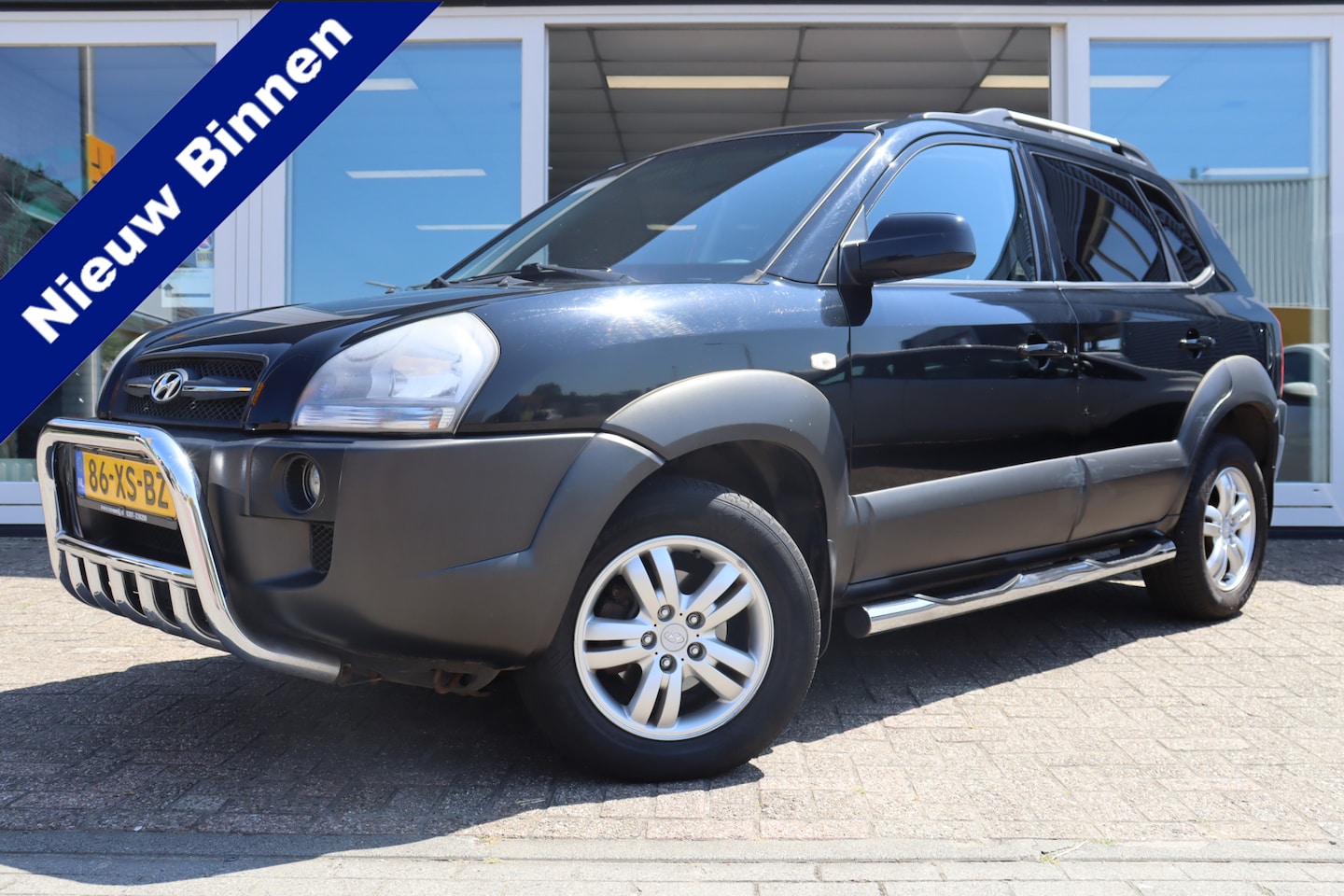 Hyundai Tucson - 2.0i Style 2.0i Style, Climate, Cruise, Elek. ramen V+A Prijs is Rijklaar inclusief 6 Maanden Garanti - AutoWereld.nl