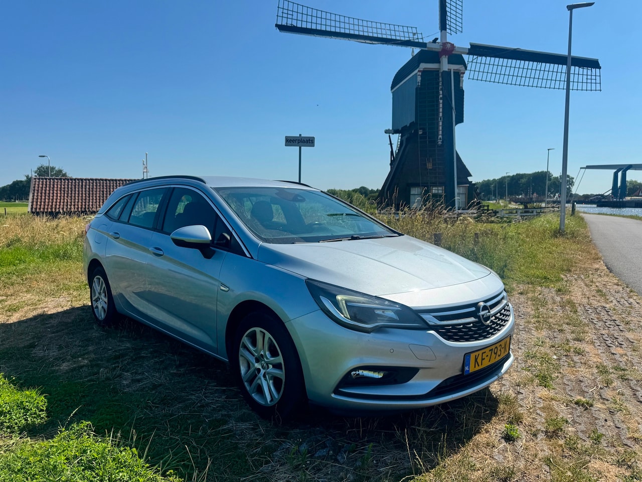 Opel Astra Sports Tourer - 1.0 Business+ * zo meeneemprijs* - AutoWereld.nl