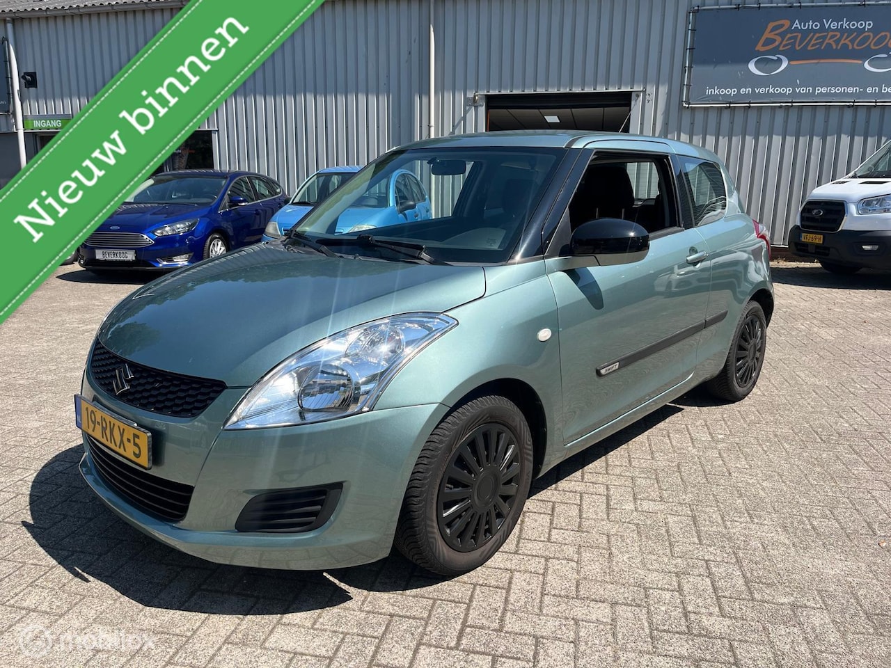Suzuki Swift - 1.2 Summer / Black Pakket - AutoWereld.nl