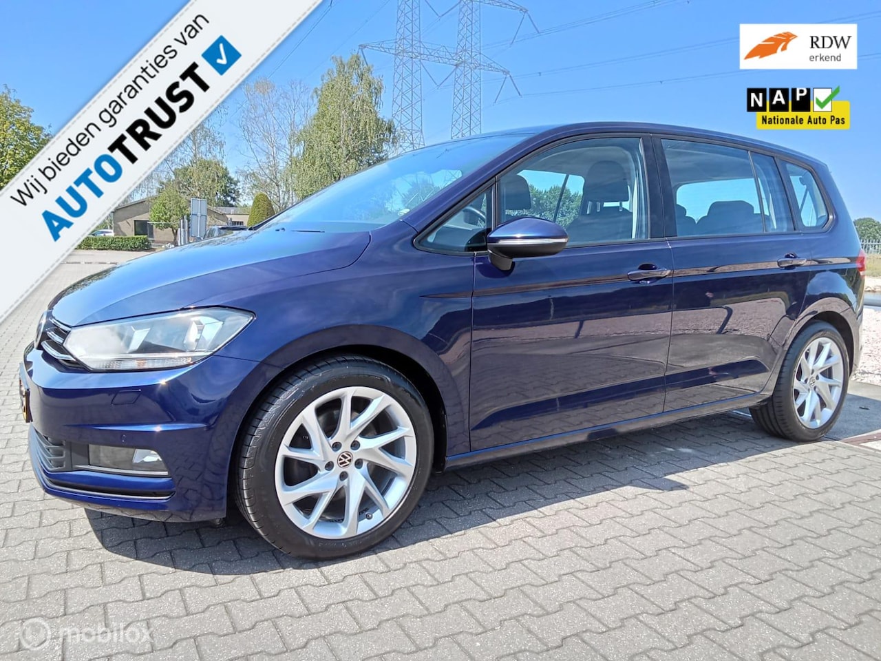 Volkswagen Touran - 1.4 TSI Highline Business R 7p/automaat/clima/navi/trekhaak - AutoWereld.nl