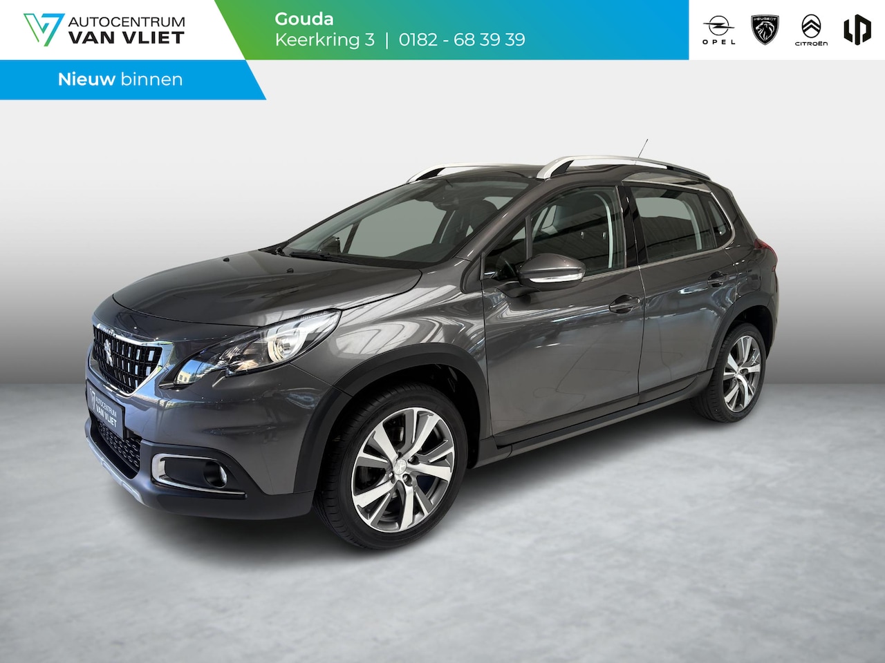 Peugeot 2008 - 1.2 PureTech Blue Lease Allure | Limited | Climate Control | Navigatie | Half-Leder | Trek - AutoWereld.nl