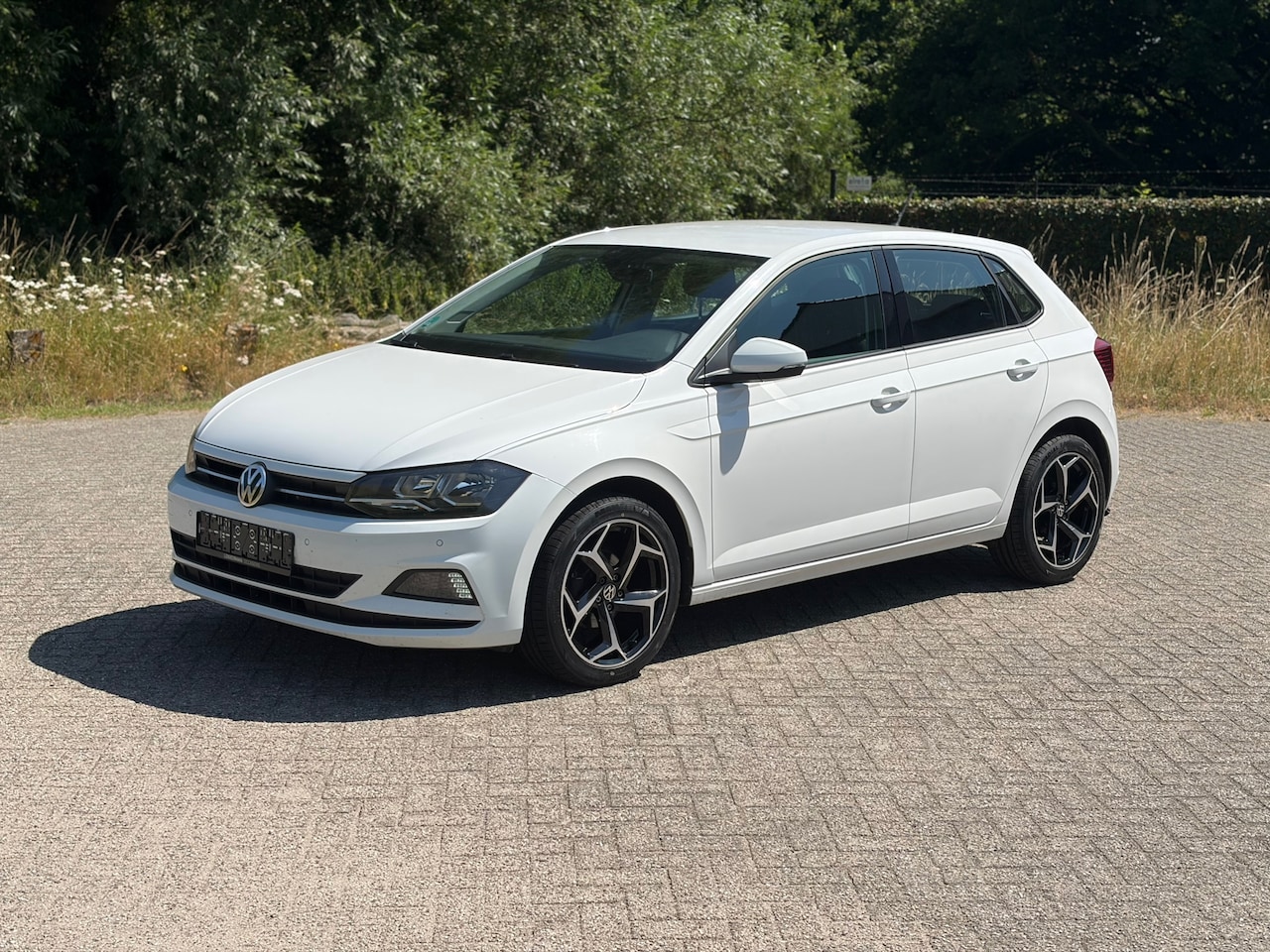 Volkswagen Polo - 1.0 High Line R-LINE VELGEN I PDC I STOELVERW I NWE APK I AIRCO - AutoWereld.nl