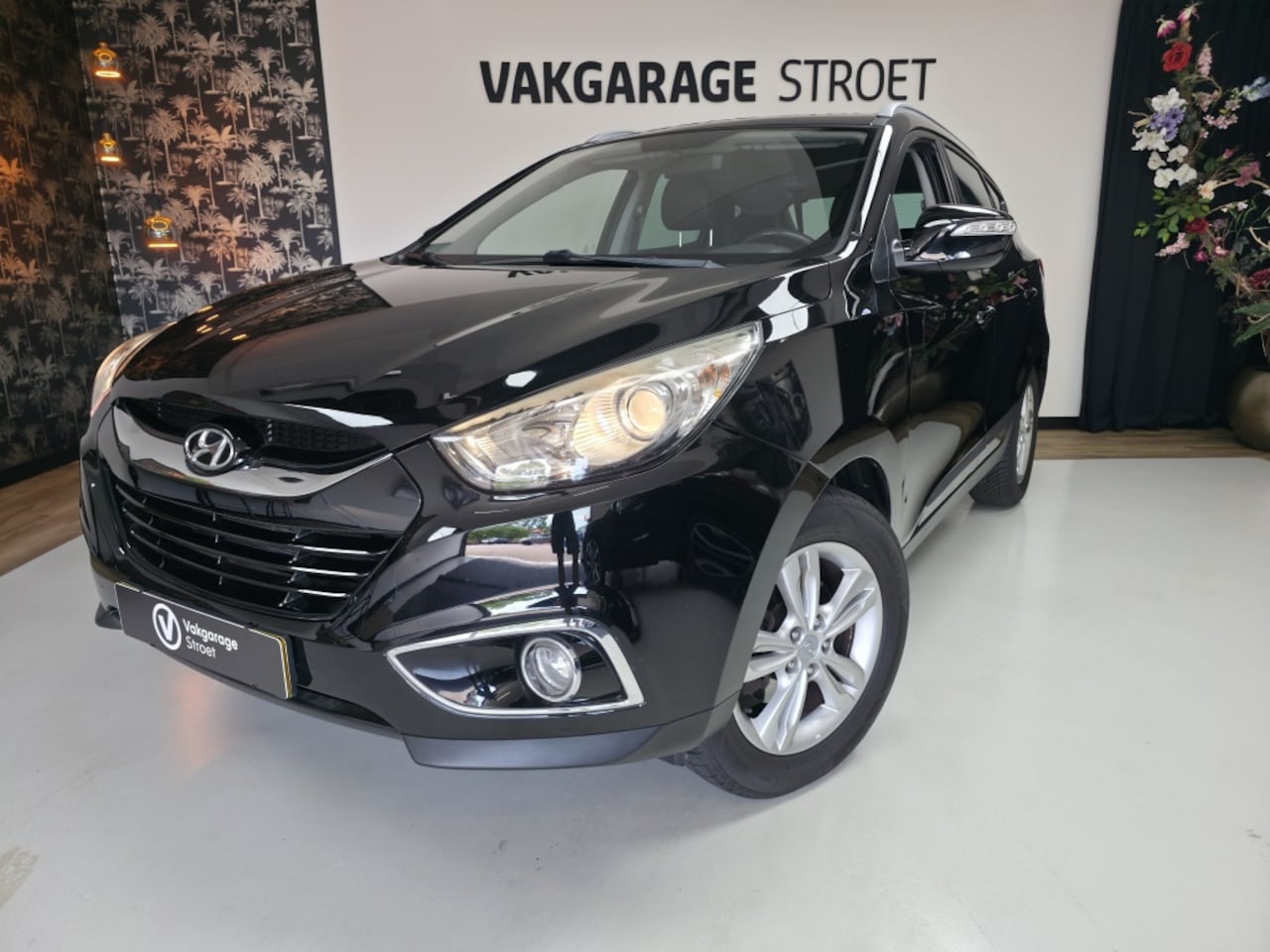 Hyundai ix35 - 2.0i Bus.Ed. | cruise | cam | clima | trekhaak | navi | brt - AutoWereld.nl