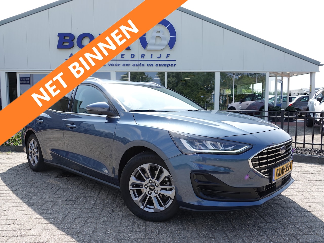 Ford Focus Wagon - 1.0 EcoBoost Hybrid Titanium AUTOM. | PDC V+A | NAVI | CRUISE - AutoWereld.nl