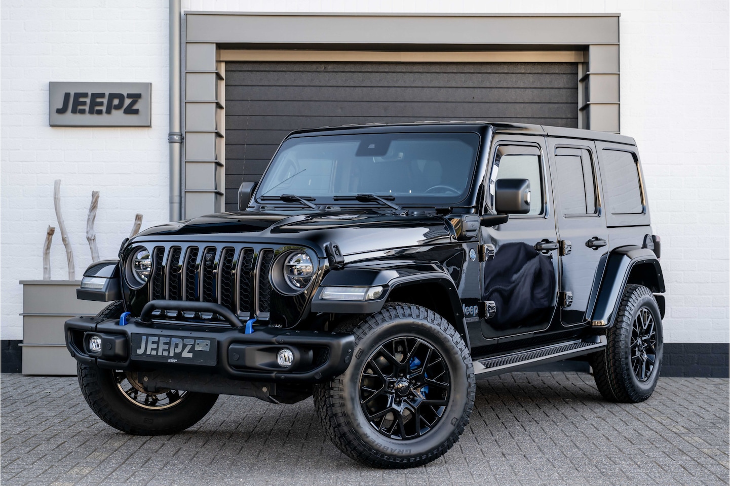 Jeep Wrangler Unlimited - 4xe 380 80th Anniversary / Ofd voorbumper - AutoWereld.nl