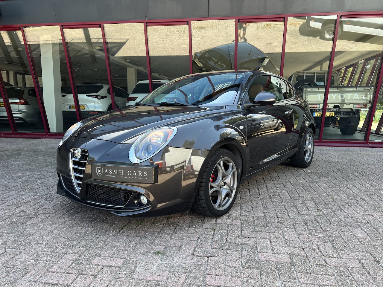 Alfa Romeo MiTo - 0.9 TwinAir Junior | Leder | Cruise | Navi | Airco | PDC | - AutoWereld.nl