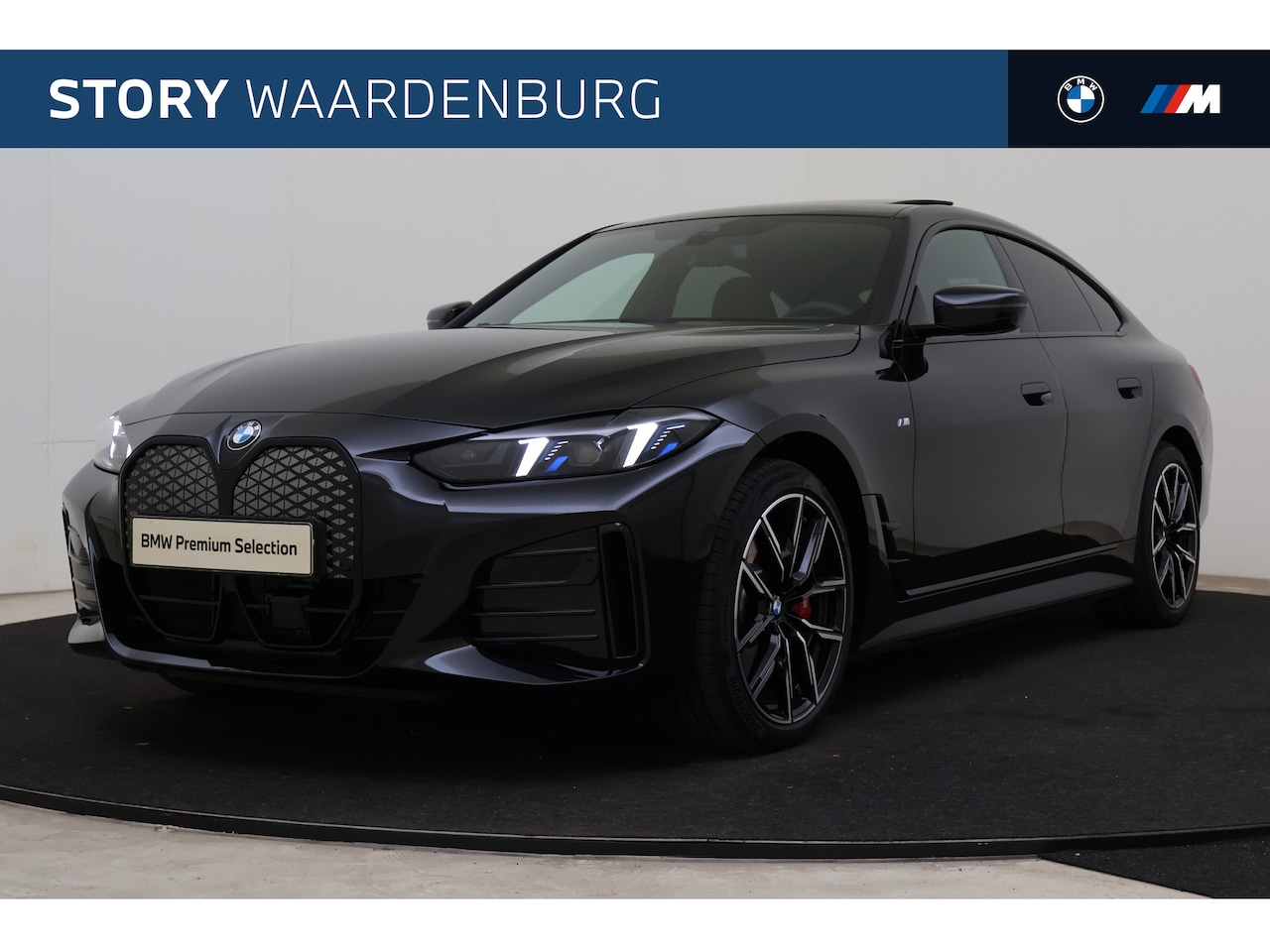 BMW i4 - eDrive40 M Sport / Schuif-kanteldak / Achteruitrijcamera / Comfort Access / Adaptieve LED - AutoWereld.nl