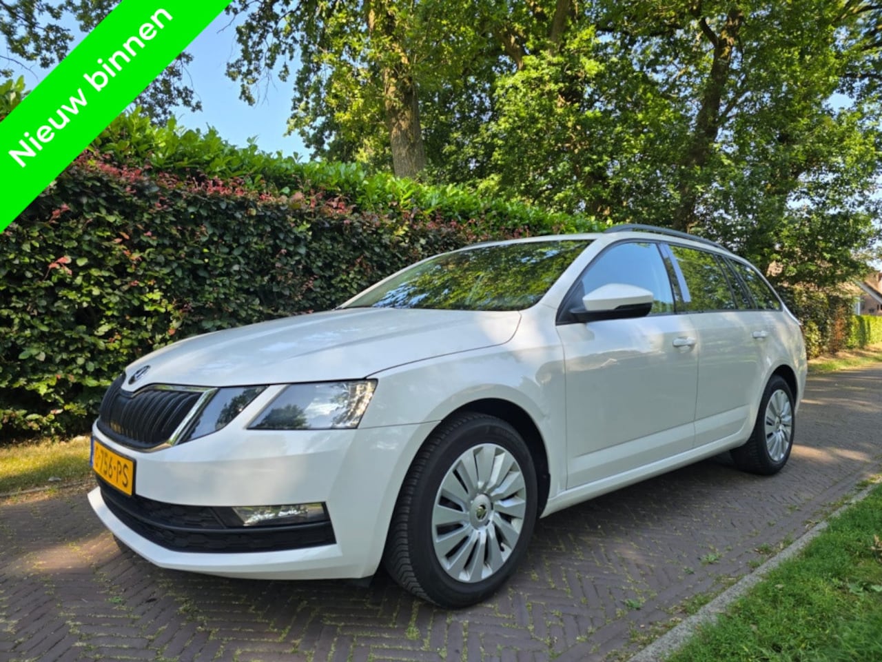 Skoda Octavia Combi - 1.6 TDI Grt Ambition - AutoWereld.nl