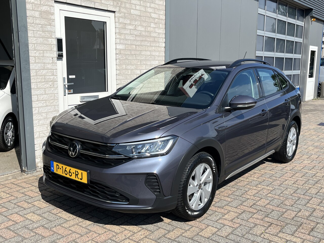 Volkswagen Taigo - 1.0 TSI Life / PARKEER SENSOREN/ DIGITAL DASH/ CRUISE/ NAVI/ AIRCO - AutoWereld.nl