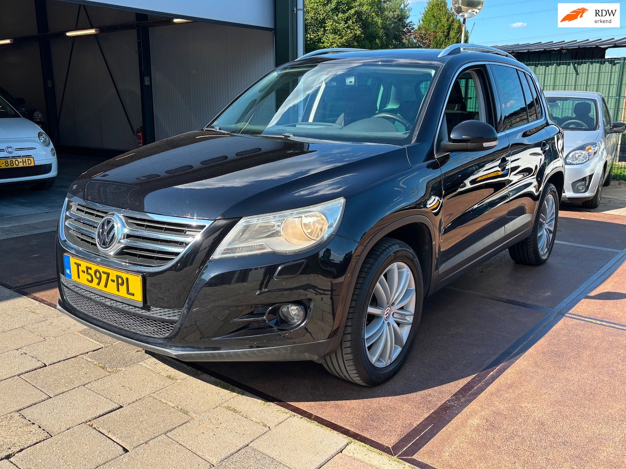 Volkswagen Tiguan - 2.0 TSI Sport&Style 4Motion BTW auto Panodak Navi Camera - AutoWereld.nl