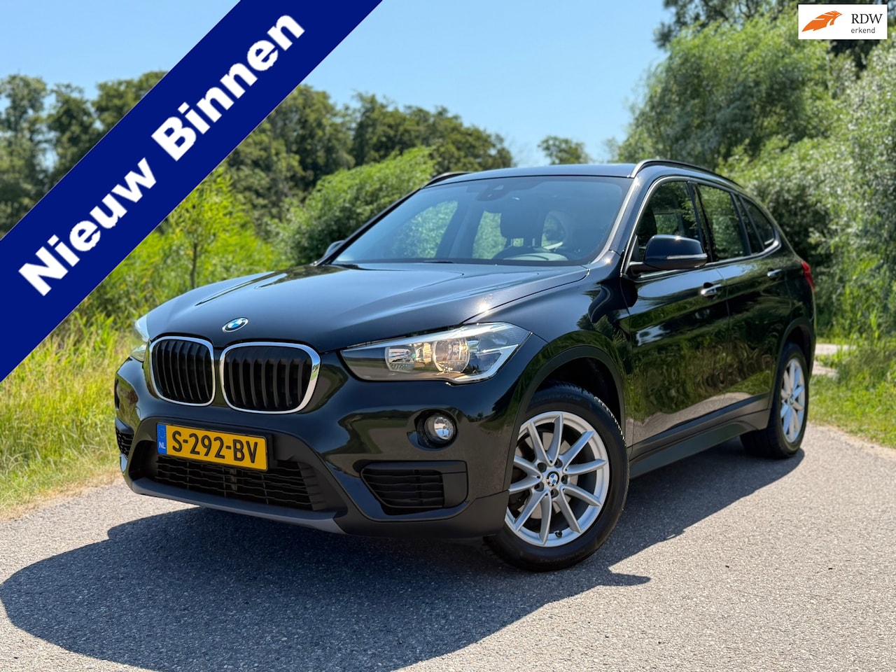 BMW X1 - SDrive18i High Executive / Automaat / Panorama dak / Leder / Navigatie / Trekhaak / Stoelv - AutoWereld.nl